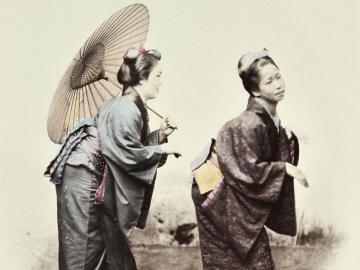 Two women with umbrella