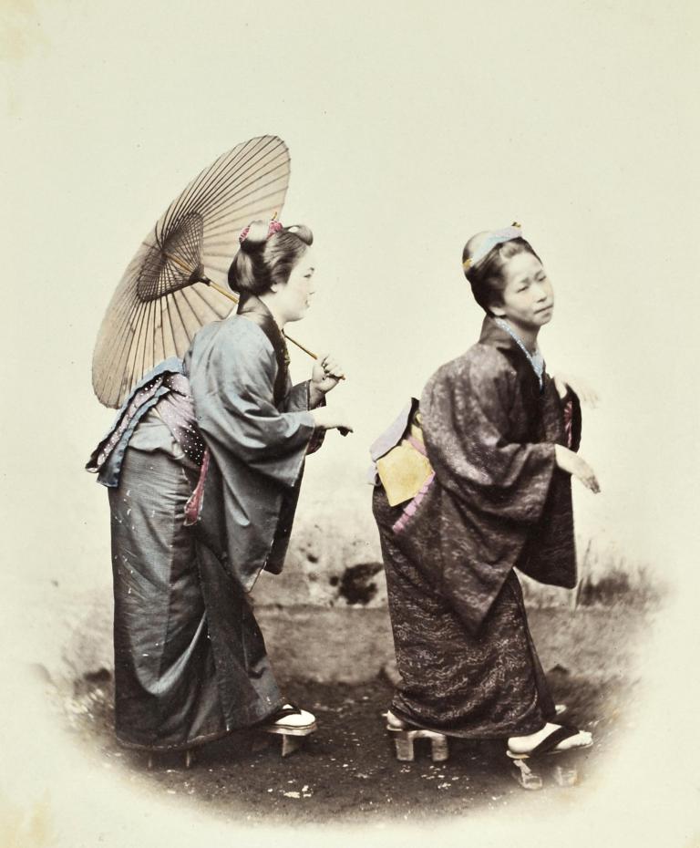 Two women with umbrella