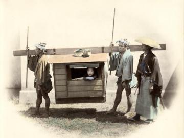 Upper class woman in a palanquin