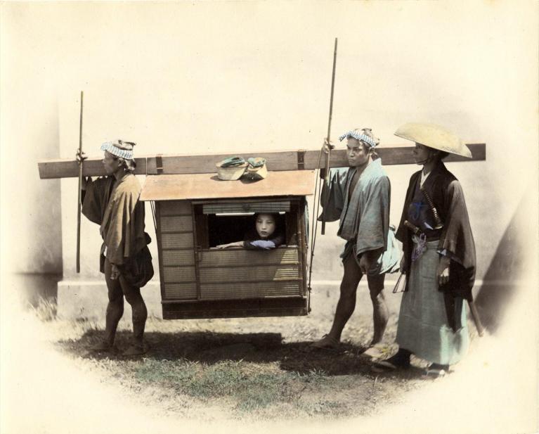 Upper class woman in a palanquin