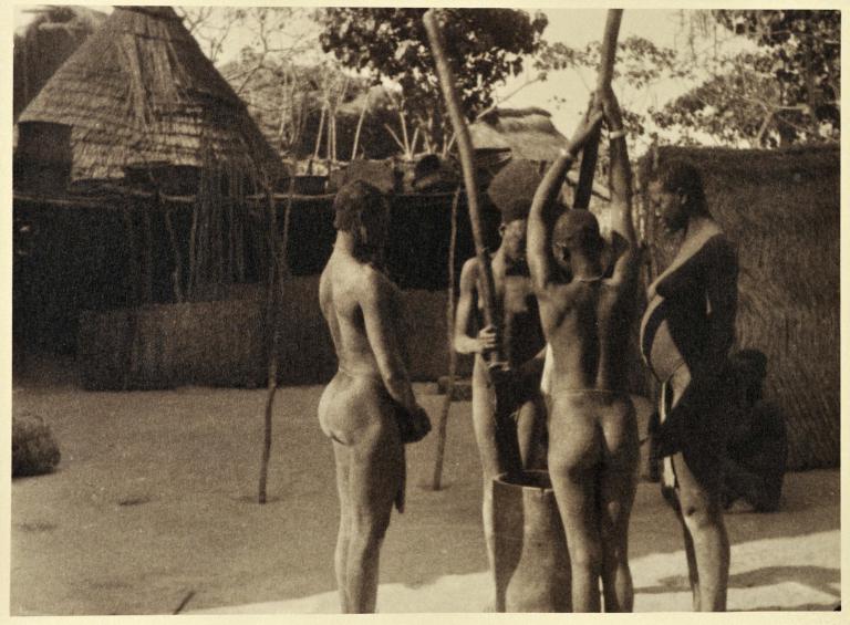 Women pounding millet