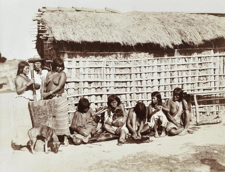 Indians in front of their house, Amazonia, Brazil