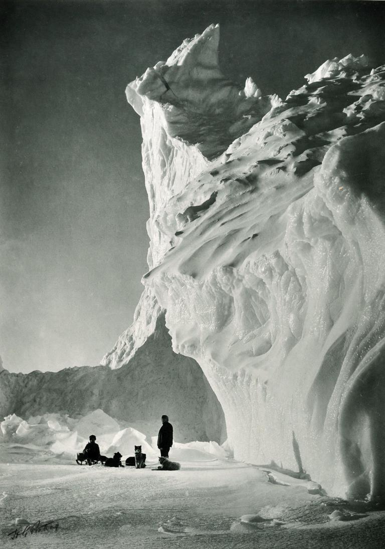 End of the Barne Glacier (Dog Team resting by an iceberg), spring 1911