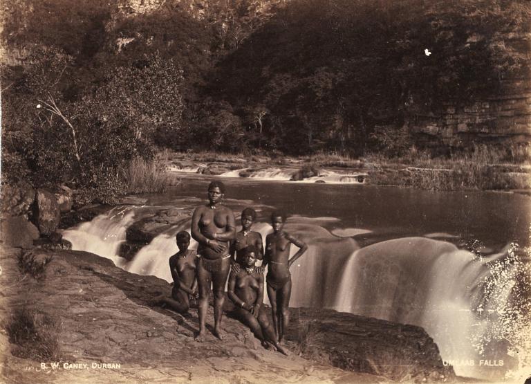 Women standing near waterfall, Umlaas Falls