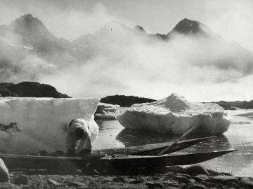 Inuit loading Kayak