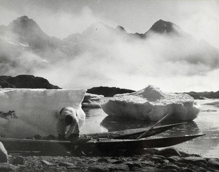 Inuit loading Kayak