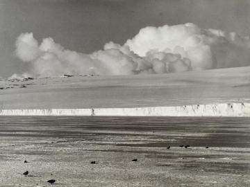 Cumulus cloud rolling up over Barne Glacier